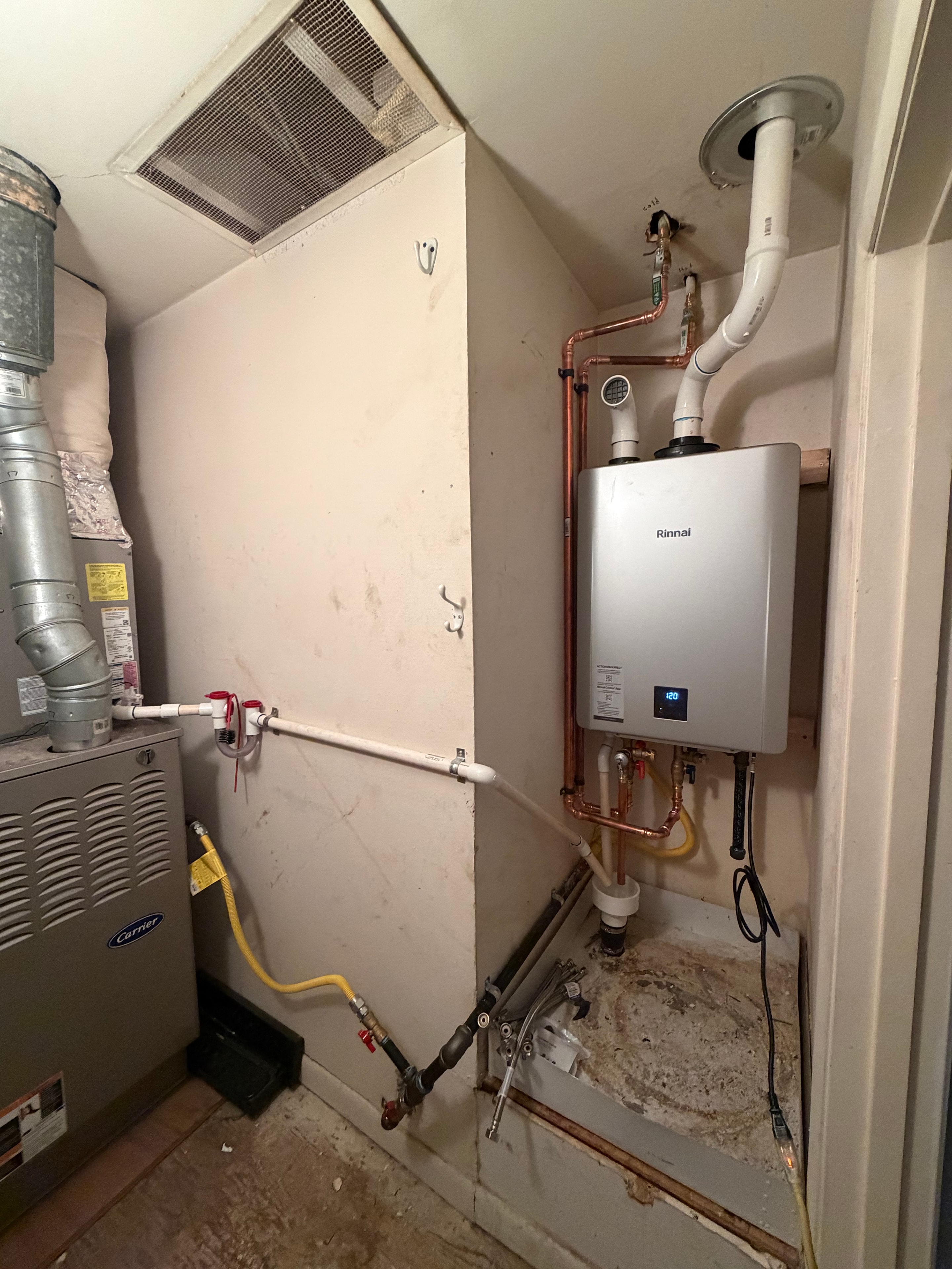 Rinnai tankless water heater utility room installation